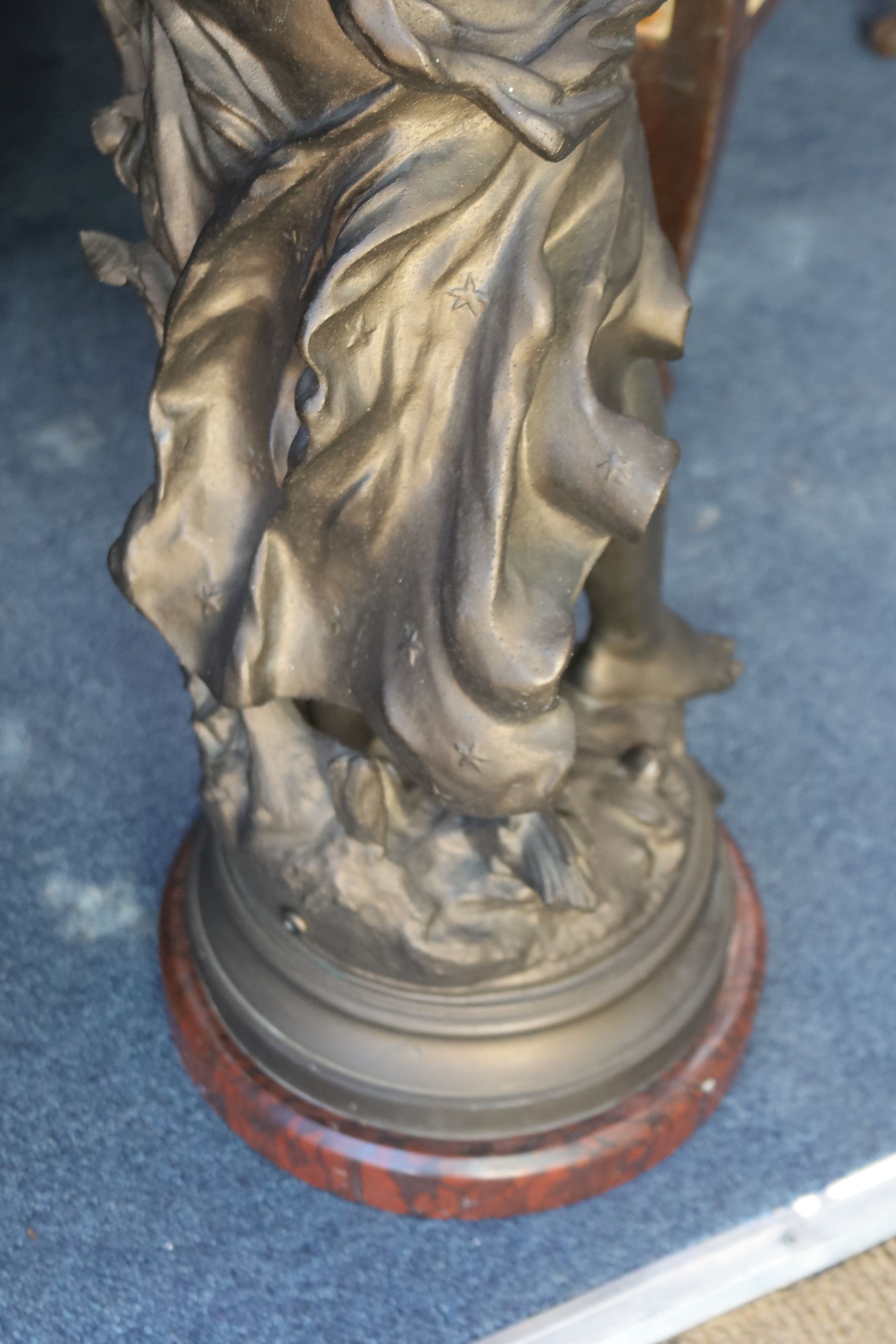 A 'Fee Aux Fleurs' cast bronze spelter fairy statue on marble base, height 90cm